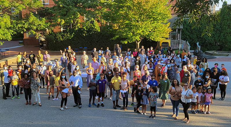 A group photo of a large group of Wheeler community members at one of the recent Meet and Greet events.