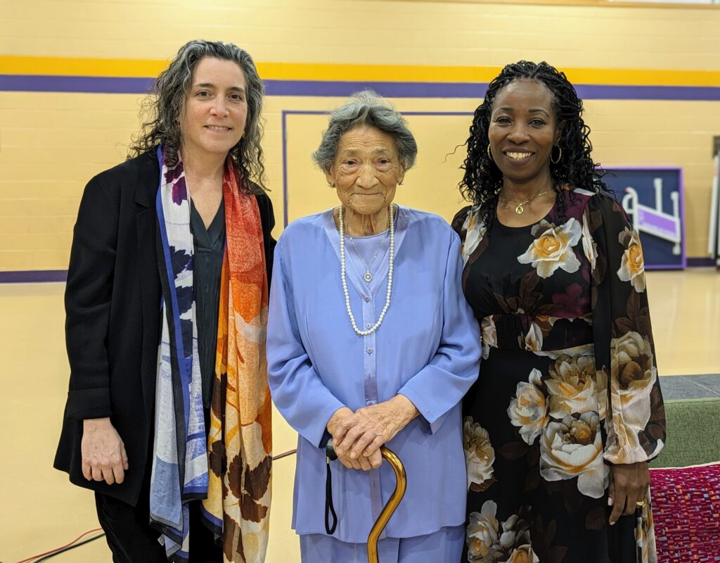 Dr. Bennie Fleming (center) standing with Head of School Allison Gaines Pell (left) and and Director of Equity, Community, & Belonging Princess Bomba (right) during a ceremony honoring her as the winner of the 2024 Wheeler Community Spirit Award. 